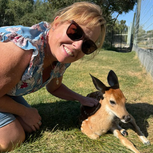 Margie Forster with a fawn